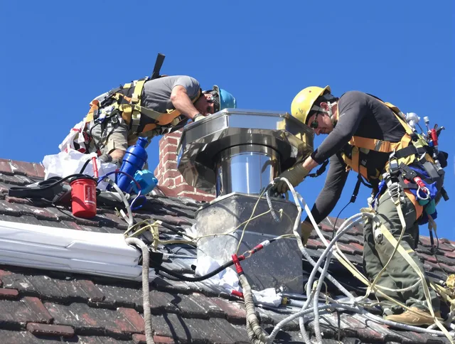 Protective chimney cap installed by Brooklyn Chimney Sweep in Brooklyn, OH
