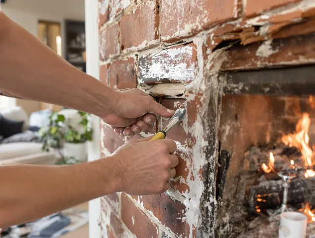 Routine fireplace repair by Brooklyn Chimney Sweep in Brooklyn, OH